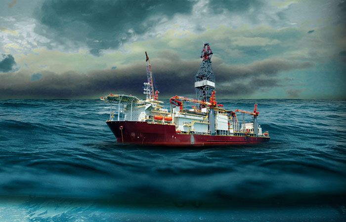 Drillship at sea in stormy conditions